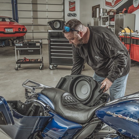 Alternate Installation Shot of Loading Subwoofer into Saddlebag