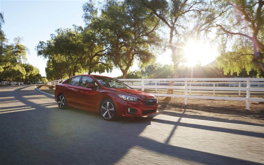 Subaru Impreza Red Hero 4-Door Sedan.